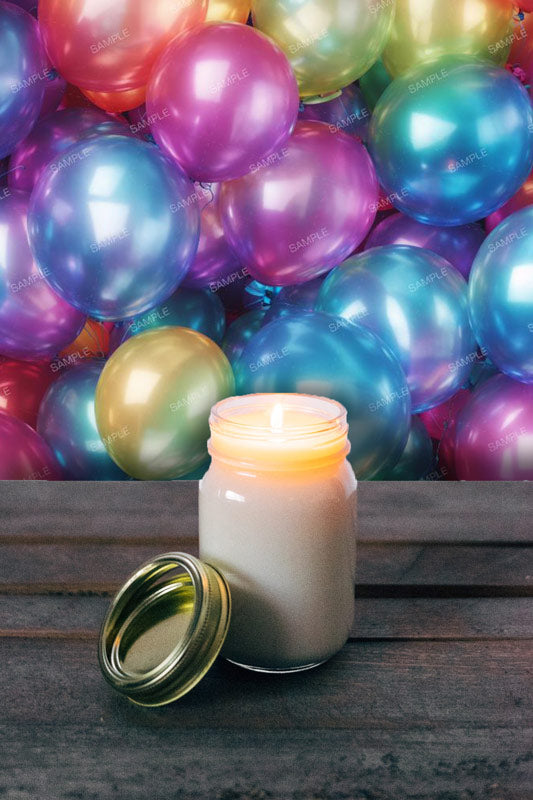 Colorful party balloons removable wallpaper pattern with candle in a jar on a wooden table