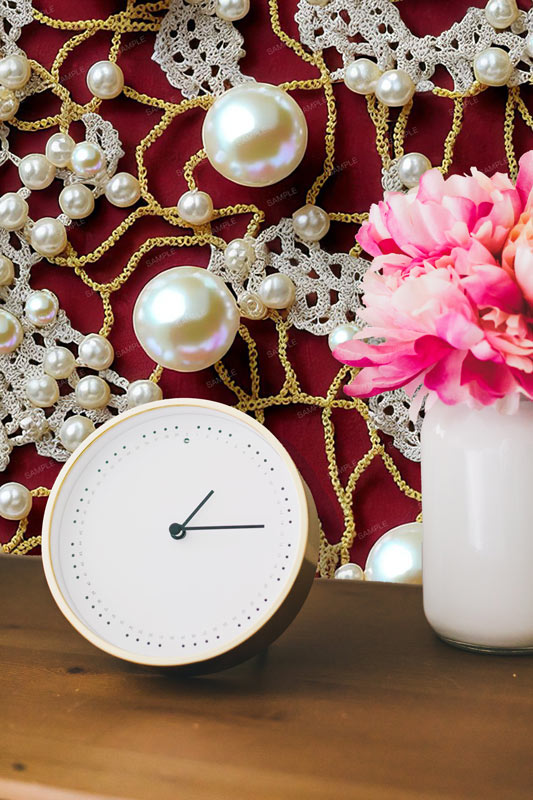 Pearls, gold chains and lace peel and stick wallpaper pattern with clock and flowers