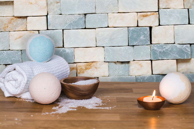 Marble Brick Peel and Stick wallpaper pattern with bath bombs and candle