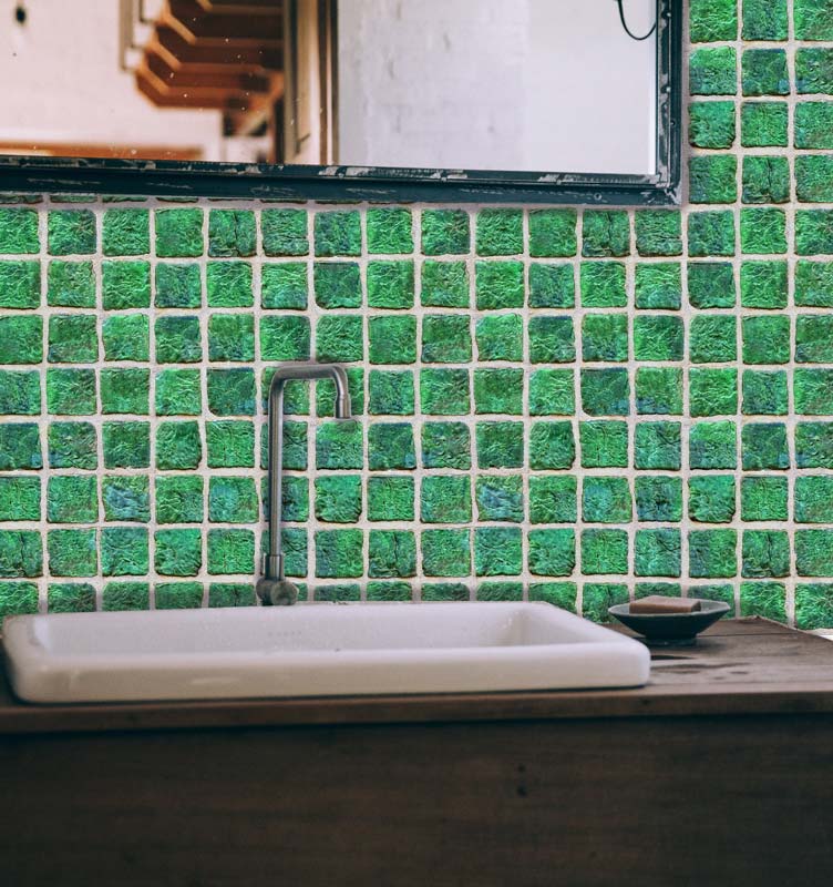 Vintage jade wallpaper on wall in rustic bathroom with mirror sink and soap dish with bar of soap