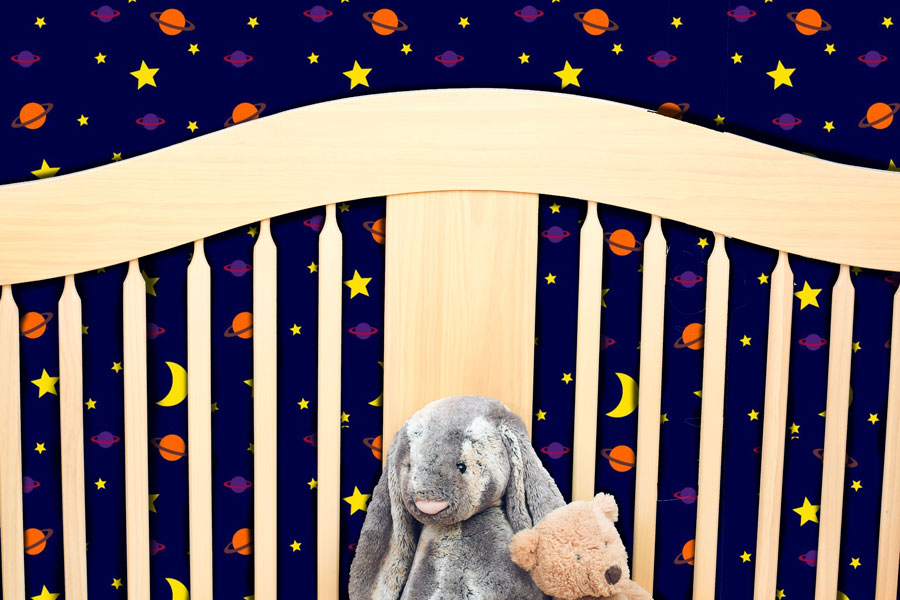 Space-peel-and-stick-wallpaper-crib